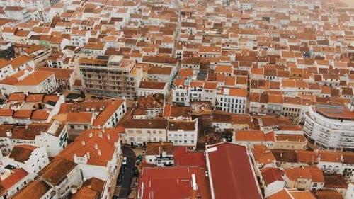 Aerial View of White Dense Building with Terracotta Roofs