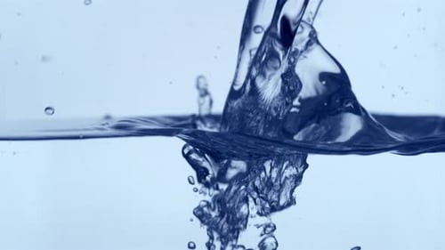 Water Pouring and Creating Bubbles in Slow Motion