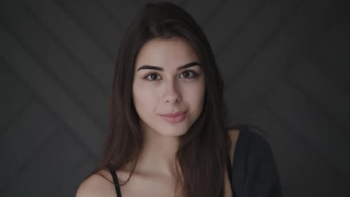 Smiling Woman Poses Indoors, Close Up Portrait