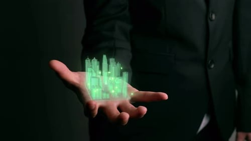 Un homme d'affaires tient un modèle de ville 3D montrant la technologie de réalité augmentée