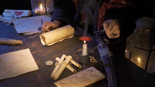 Candlelit Desk With Ornate Writing Implements