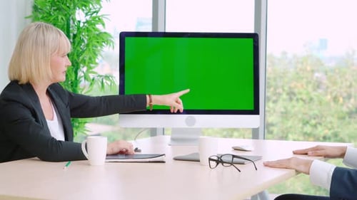 Business People in the Conference Room with Green Screen