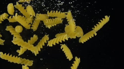 Pasta Falling Into Water