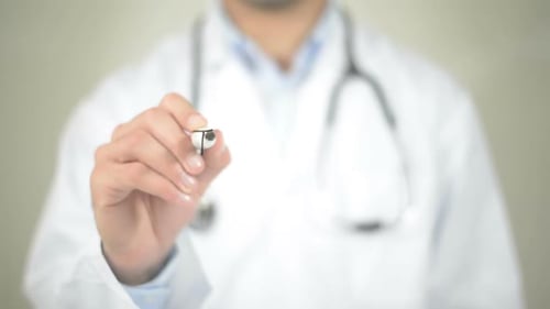 Doctor Writing Toothache on Screen in Clinic
