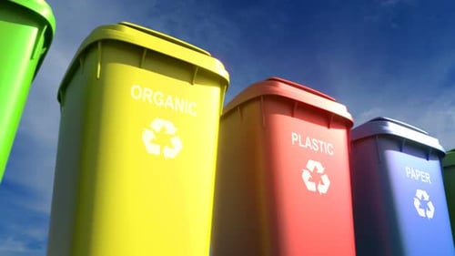 Multi-colored Plastic Garbage Bins with Waste Type Labels and Recycle Logos