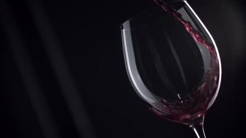 Red Wine Pouring into glass