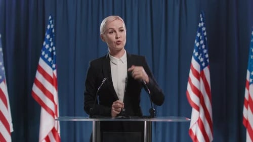 Woman Giving Political Speech at Podium