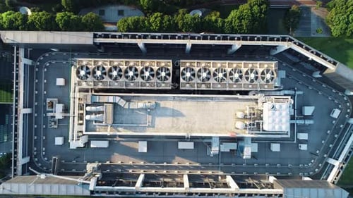 Aerial Top Down View of Ventilation and Air Conditioning Systems Installed on the Rooftop of a