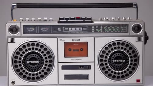 Cassette Tape Coming Out of Stereo Hifi