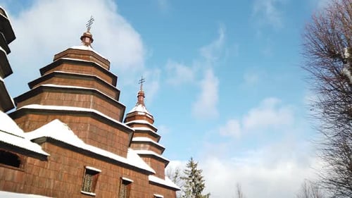 Old Ukrainian traditional vintage village. Elements of architecture. Wooden church.