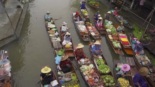 Damnoen Saduak Floating Market or Amphawa. Local people sell fruits, traditional food on boats
