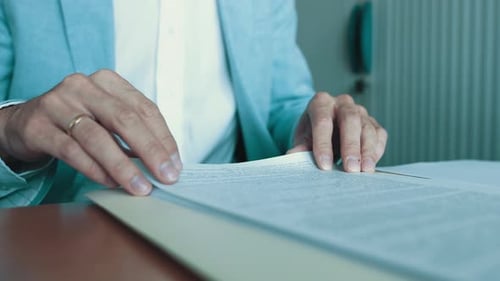 Close Up of Hands of Young Businessman Lawyer or Man Working with Documents