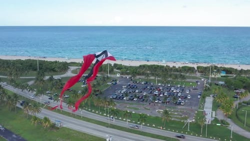 Aerial of the Kites Soaring Above the Blue Ocean. Summer Nature of Florida