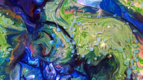Vibrant Inks Mixing Abstractly with Bubbles