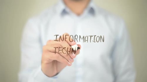 Hand Writes Information Technology on Clear Surface