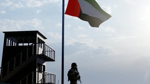 United Arab Emirates Flag Waving At Guard Post