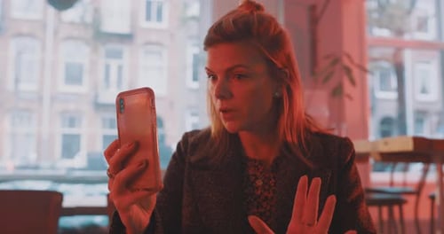 Classy woman facetiming close up