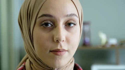 Woman with Headscarf Looking at Camera
