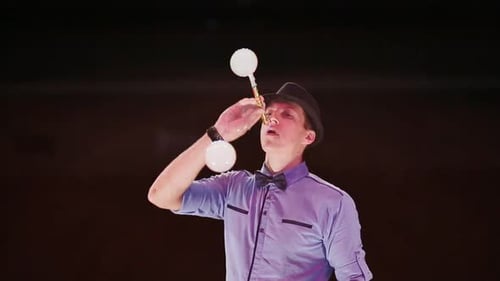 Man Bubble Juggling Bubbles on Stage