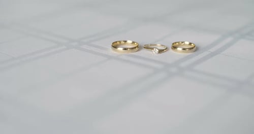 Gold Wedding Rings and Diamond Engagement Ring