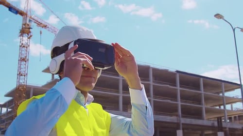 Workplace of freelance worker at home office. Young man works using computer.