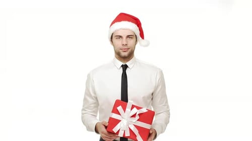 Smiling Man Holding Gift, Wearing Santa Hat