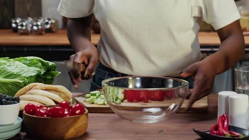 Vegetables Being Chopped For a Salad in Kitchen