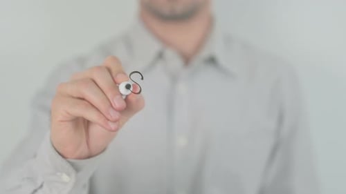Man Writes Word Support on Transparent Surface