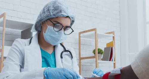 Real Vaccination. Scientist Injecting Syringe To Vein in Male Hand and Inputting Vaccine, Close Up