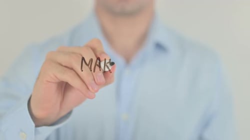 Man Writes Make a Difference on Glass