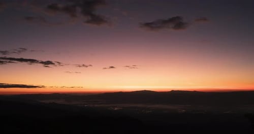 Time Lapse of foggy mountain with sunrise