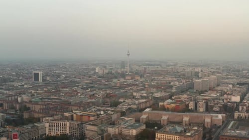 AERIAL: Beautiful View Over Berlin, Germany Alexanderplatz Tower in Beautiful Grey Autumn Sunlight