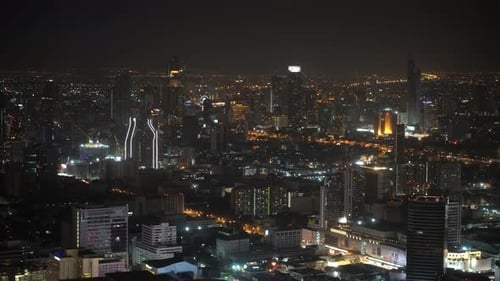 night city view from above. skyscrapers and traffic on the roads. urban style