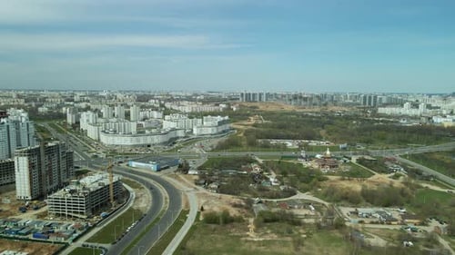 Urban Cityscape Aerial View Under Partly Cloudy Sky