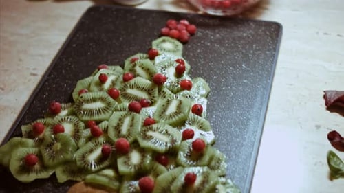 Christmas Tree Dessert Made of Kiwi and Berries