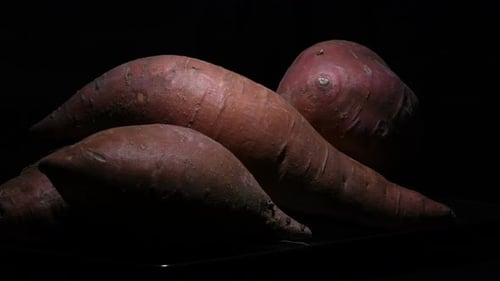 Close Up of Sweet Potatoes with Dramatic Lighting