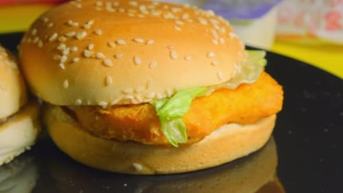 Hamburgers with Lettuce on a Black Plate