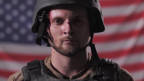 Injured Soldier with American Flag Background