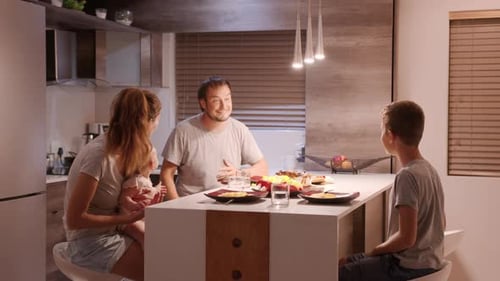 Smiling Family Enjoying Time Together at Home