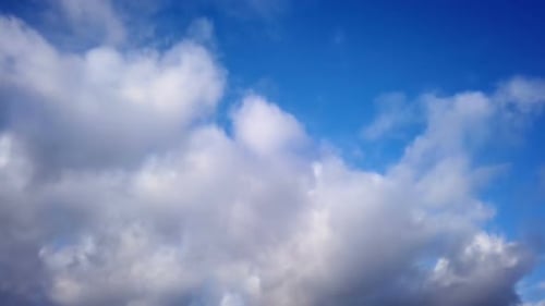 By Blue Clouds Run Through the Sky