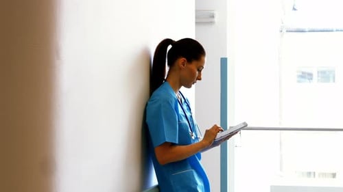 Nurse using digital tablet