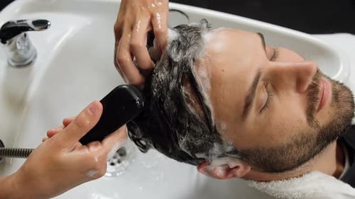 Man getting his hair wash