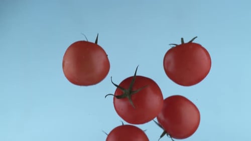 Tomatoes flying in slow motion, shot with Phantom Flex 4K at 1000 frames per second