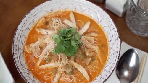 Top view served table in a restaurant with curry soup