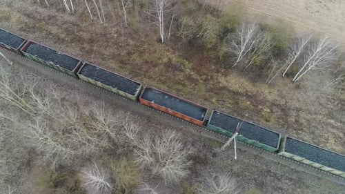 Countryside Freight Train Ride on Railroad Transports Gravel in Containers View From Height