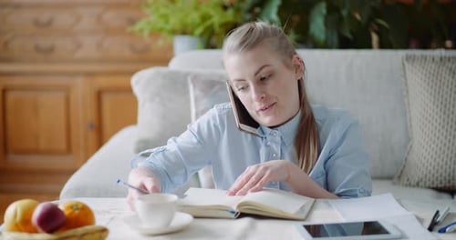 Woman Talking on Smartphone - Home Office