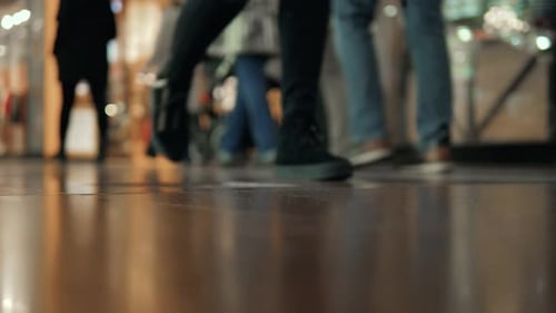 Low Angle View of People Walking Indoors