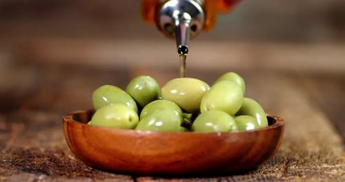 Olive Oil with Air Bubbles. Macro Background. The Texture of Olive Oil