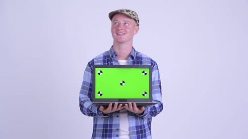 Young Adult Holding Chroma Key Laptop
