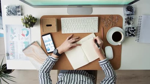 Office Worker Types at Clean White Desk